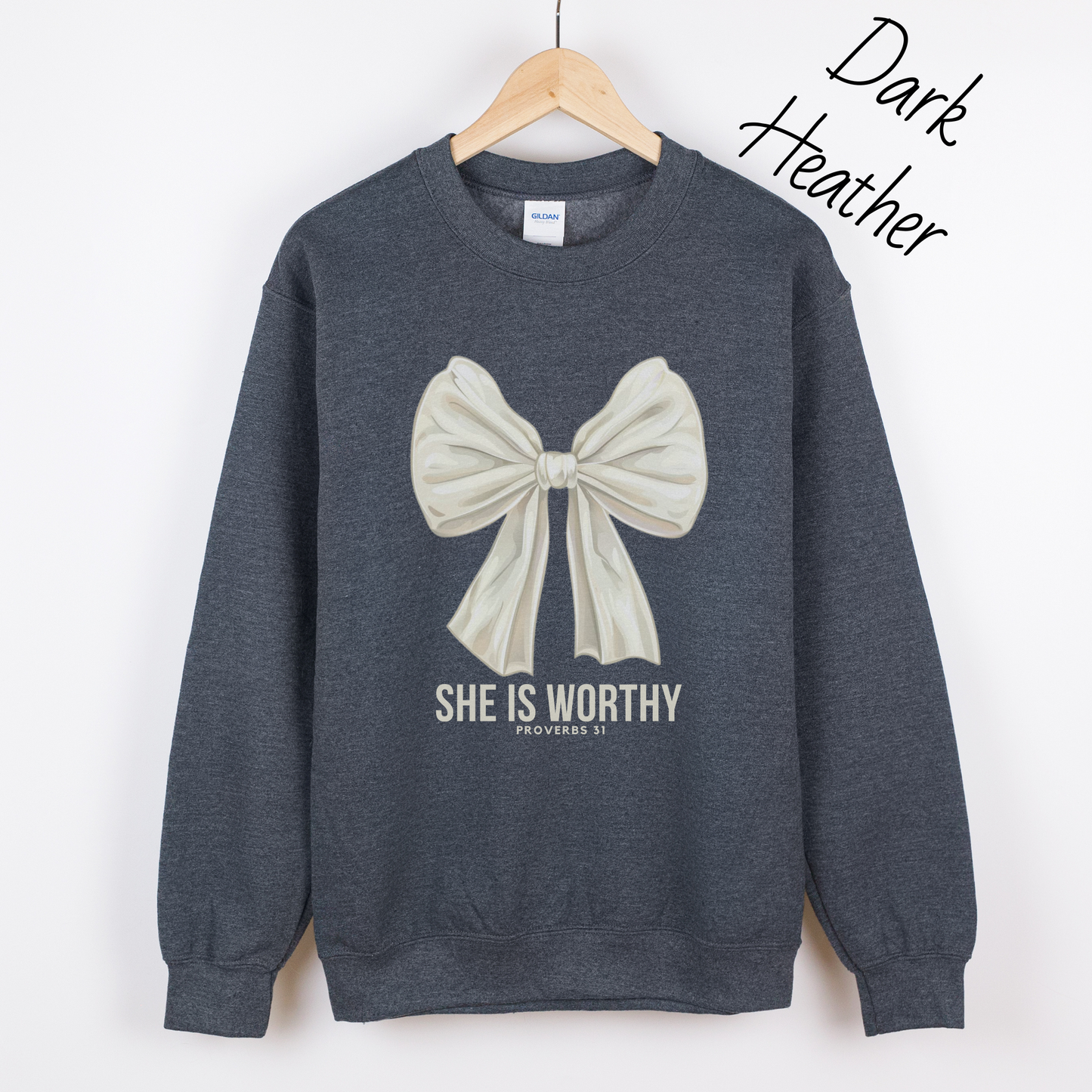 Large white bow with the words "She is Worthy Proverbs 31" on a dark grey sweatshirt.